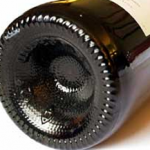 The purpose of the indentation on a wine bottle photo