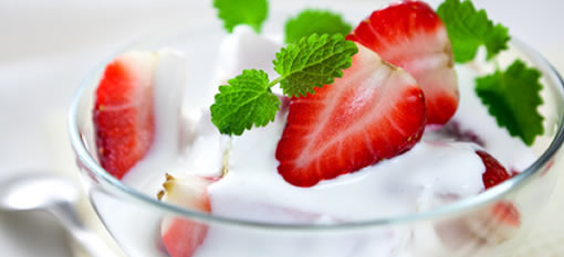 Fresh strawberries and plain greek yogurt photo