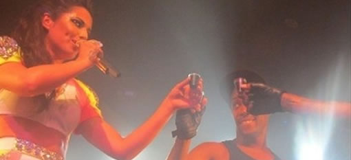 Cheryl Cole downs tequila shot on stage photo