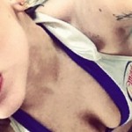 Lady Gaga fills up a Miller Lite beer bikini photo