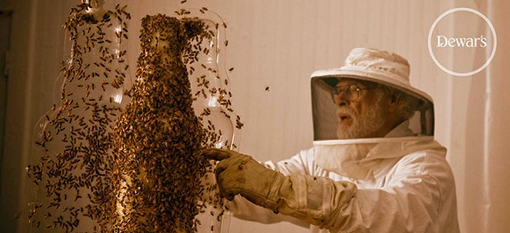 Distillery Enlists Army Of Bees To Decorate Their Whiskey Bottle photo