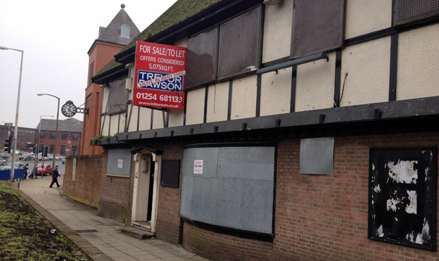 The places where the pubs are boarded up photo