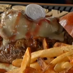 Unholy row as restaurant cooks up burgers topped with communion wafers and red wine sauce photo