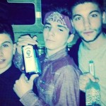 Madonna Causes Controversy for Posting a Picture of Her Son Rocco, 13, Holding a Liquor Bottle photo