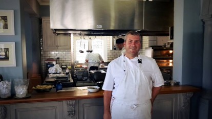 Chef Ryan Smith in front of his brand new open-plan kitchen in Franschhoek.