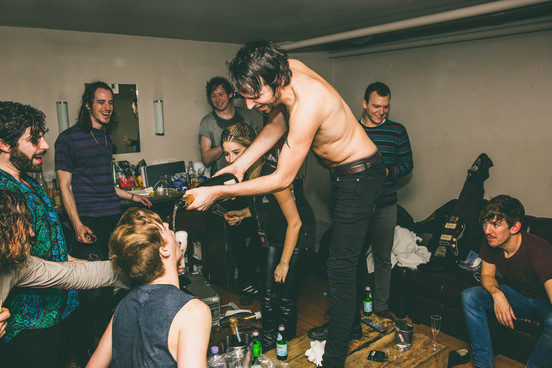 The Foals say they drank about 130 bottles of red wine while recording new album photo