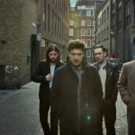Mumford and Sons get festival ready with tequila and a hug photo