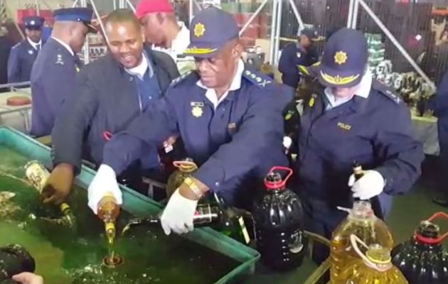 SA Police pours 30 000 litre of illegal liquor down the drain in Cape Town every month photo
