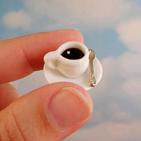 Start your day gently with the world`s smallest cup of coffee photo