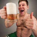 Guys watch out! Your favourite pint of beer could be giving you MAN BOOBS photo