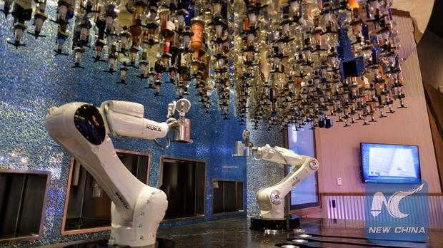 Robot Bartender Serves Drinks At Bar In Las Vegas photo