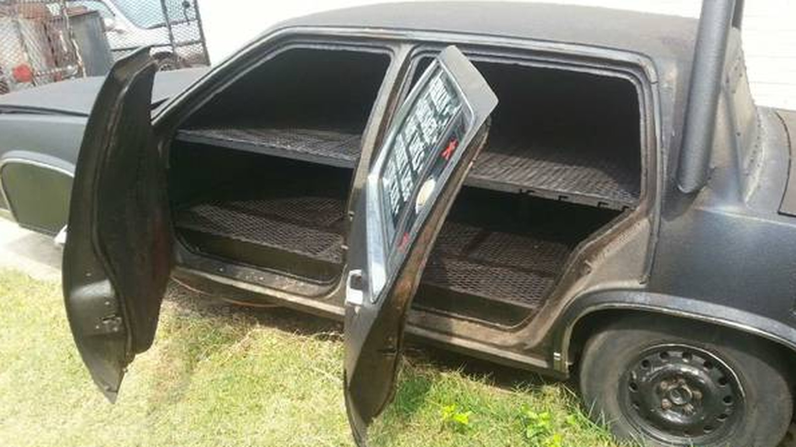 Somebody Buy This Ridiculous Cadillac Deville Barbecue Smoker photo