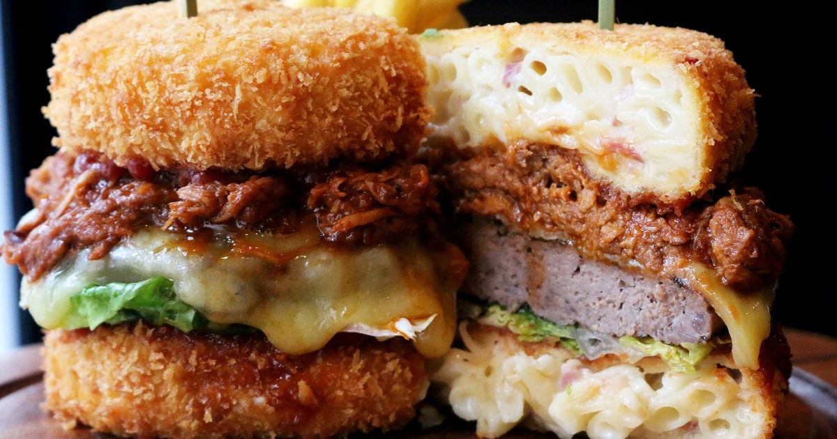 This Beef Burger Comes With A Mac And Cheese Bun… And Pulled Pork photo