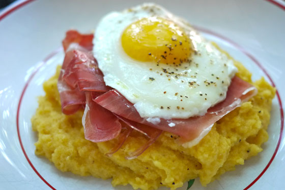 Ham and Eggs served on Polenta photo