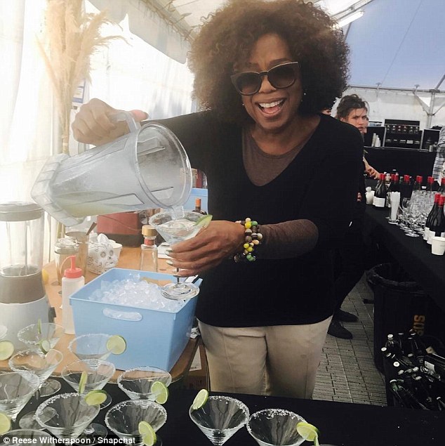 Oprah Winfrey loves drinking margaritas, according to Reese Witherspoon. photo