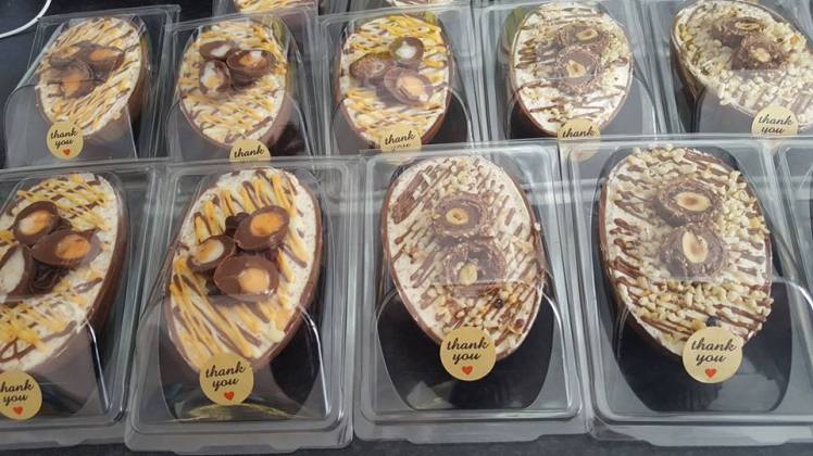 A Cafe Is Selling Creme Egg And Ferrero Rocher Cheesecakes Inside Easter Eggs photo