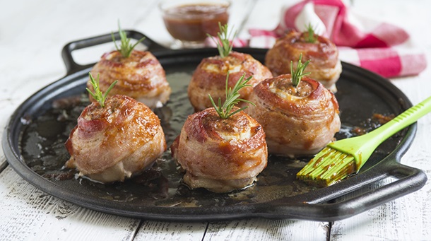 How to make stuffed onion bombs, wrapped in bacon! photo