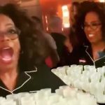 Oprah Hands Out Shots In Her Pajamas photo