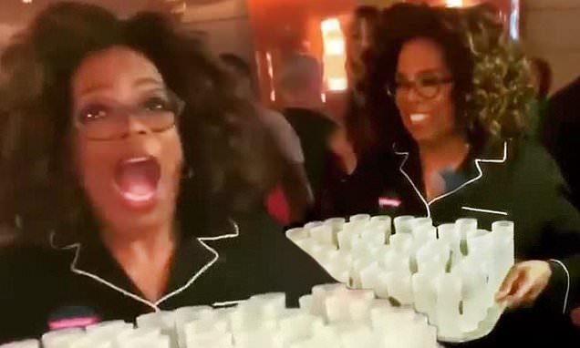 Oprah Hands Out Shots In Her Pajamas photo