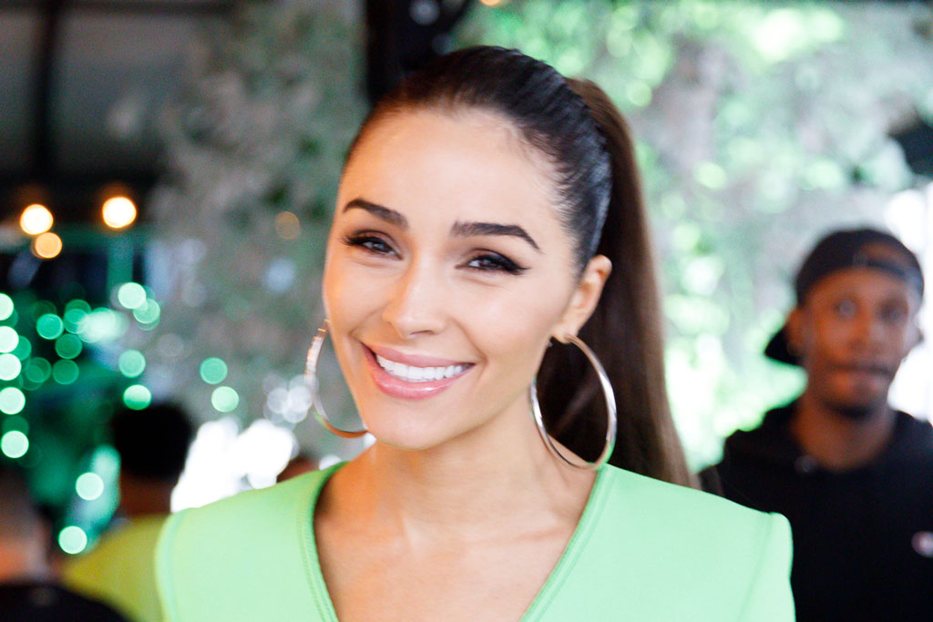 Olivia Culpo Wears The Shortest Minidress With Soaring Silver Heels At Bacardi Brunch photo
